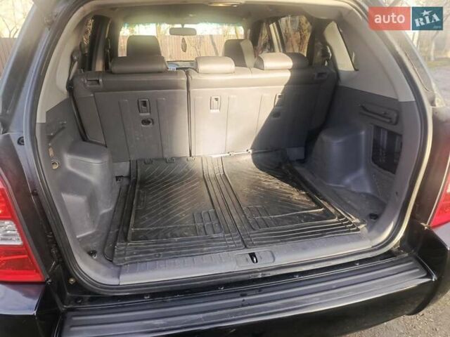 Черный Хендай Туксон, объемом двигателя 1.99 л и пробегом 302 тыс. км за 6300 $, фото 11 на Automoto.ua