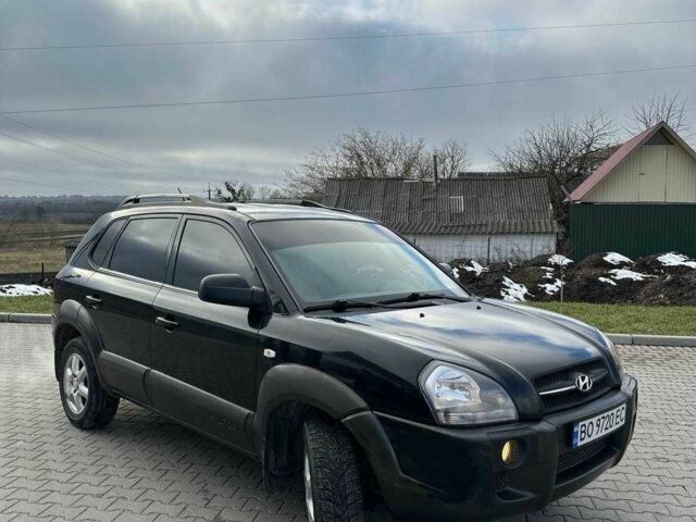 Черный Хендай Туксон, объемом двигателя 2 л и пробегом 180 тыс. км за 6450 $, фото 12 на Automoto.ua