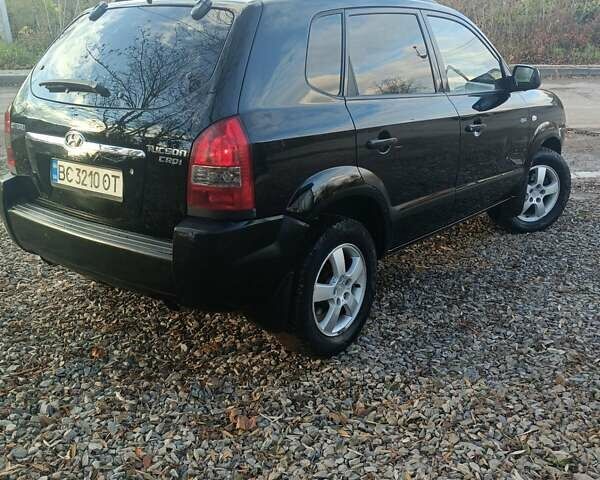 Черный Хендай Туксон, объемом двигателя 2 л и пробегом 236 тыс. км за 6000 $, фото 9 на Automoto.ua
