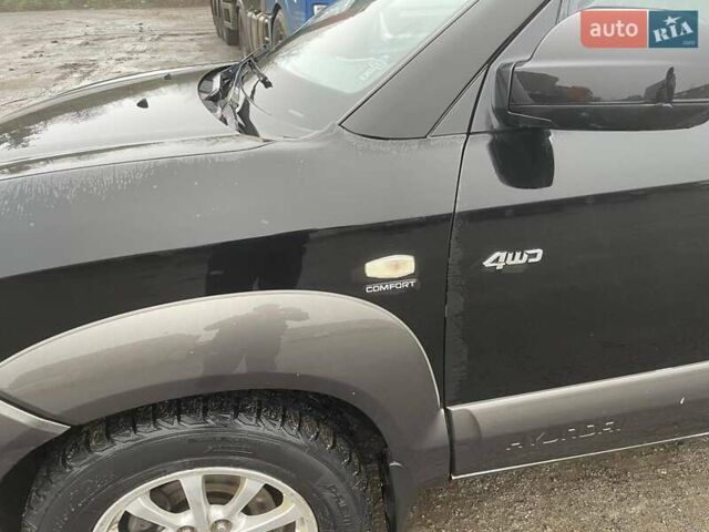 Черный Хендай Туксон, объемом двигателя 1.99 л и пробегом 204 тыс. км за 6100 $, фото 22 на Automoto.ua