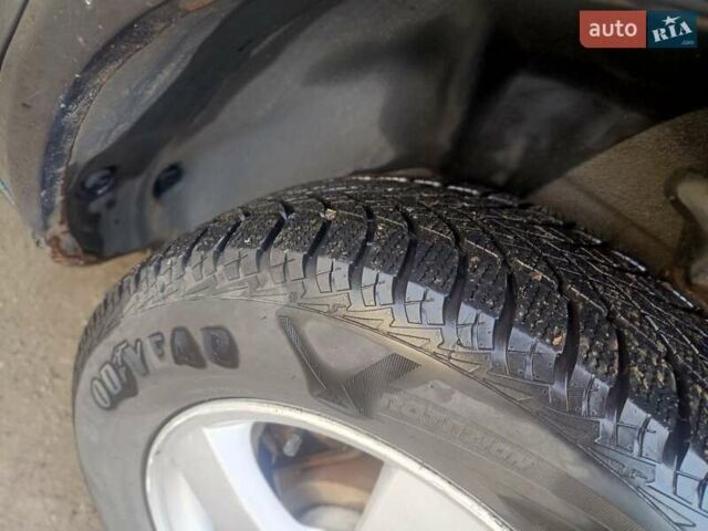 Черный Хендай Туксон, объемом двигателя 1.99 л и пробегом 302 тыс. км за 6300 $, фото 12 на Automoto.ua