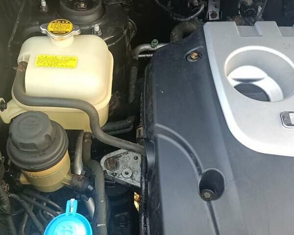 Черный Хендай Туксон, объемом двигателя 2 л и пробегом 236 тыс. км за 6000 $, фото 29 на Automoto.ua