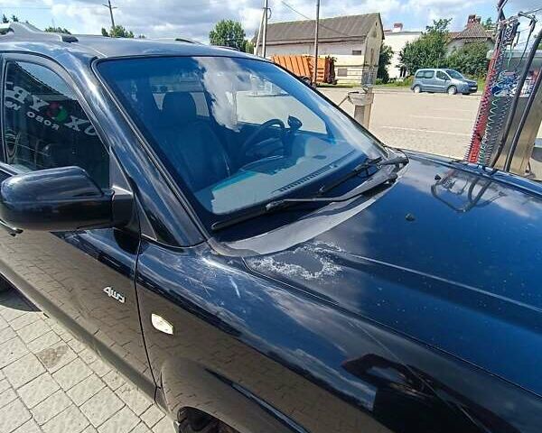 Черный Хендай Туксон, объемом двигателя 2 л и пробегом 235 тыс. км за 5500 $, фото 9 на Automoto.ua