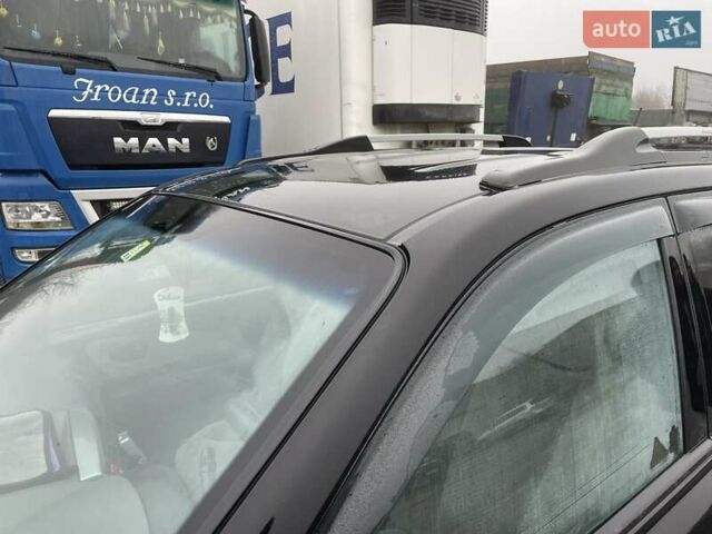 Черный Хендай Туксон, объемом двигателя 1.99 л и пробегом 204 тыс. км за 6100 $, фото 29 на Automoto.ua