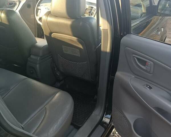 Черный Хендай Туксон, объемом двигателя 2 л и пробегом 236 тыс. км за 6000 $, фото 14 на Automoto.ua