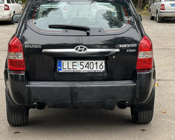Черный Хендай Туксон, объемом двигателя 2 л и пробегом 280 тыс. км за 3250 $, фото 3 на Automoto.ua