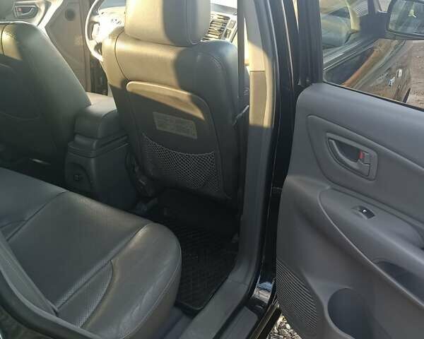 Черный Хендай Туксон, объемом двигателя 2 л и пробегом 236 тыс. км за 6000 $, фото 13 на Automoto.ua