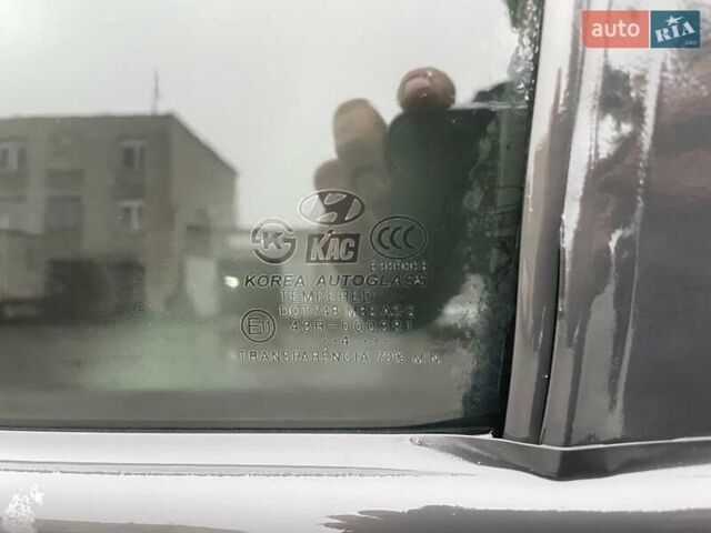 Черный Хендай Туксон, объемом двигателя 1.99 л и пробегом 204 тыс. км за 6100 $, фото 32 на Automoto.ua