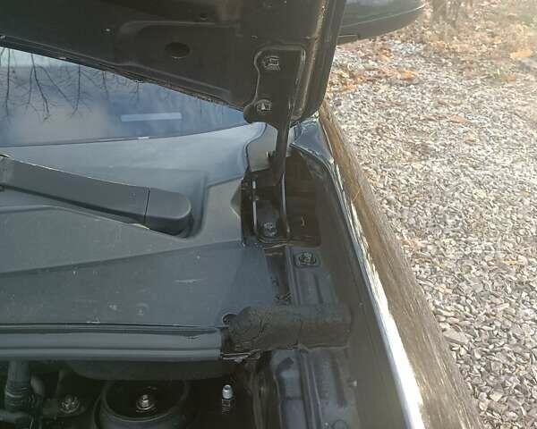 Черный Хендай Туксон, объемом двигателя 2 л и пробегом 236 тыс. км за 6000 $, фото 23 на Automoto.ua