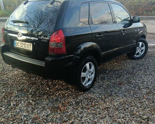Черный Хендай Туксон, объемом двигателя 2 л и пробегом 236 тыс. км за 6000 $, фото 6 на Automoto.ua