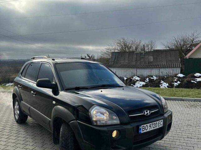 Черный Хендай Туксон, объемом двигателя 2 л и пробегом 180 тыс. км за 6450 $, фото 21 на Automoto.ua