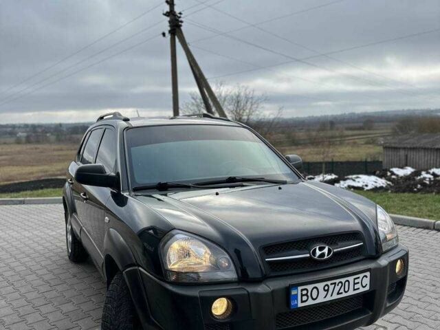 Черный Хендай Туксон, объемом двигателя 2 л и пробегом 180 тыс. км за 6450 $, фото 4 на Automoto.ua
