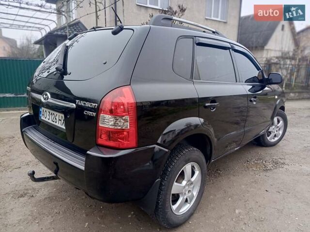 Черный Хендай Туксон, объемом двигателя 1.99 л и пробегом 302 тыс. км за 6300 $, фото 15 на Automoto.ua
