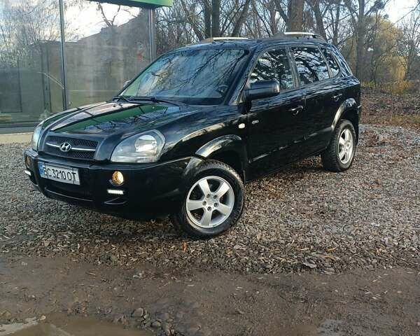 Черный Хендай Туксон, объемом двигателя 2 л и пробегом 236 тыс. км за 6000 $, фото 5 на Automoto.ua