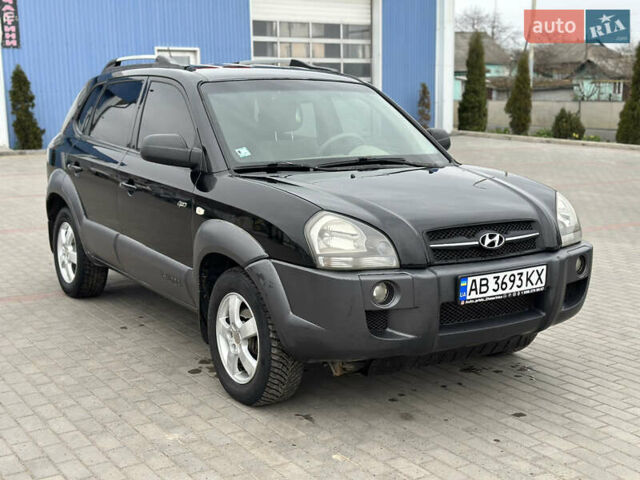 Чорний Хендай Туксон, об'ємом двигуна 2 л та пробігом 317 тис. км за 6100 $, фото 9 на Automoto.ua