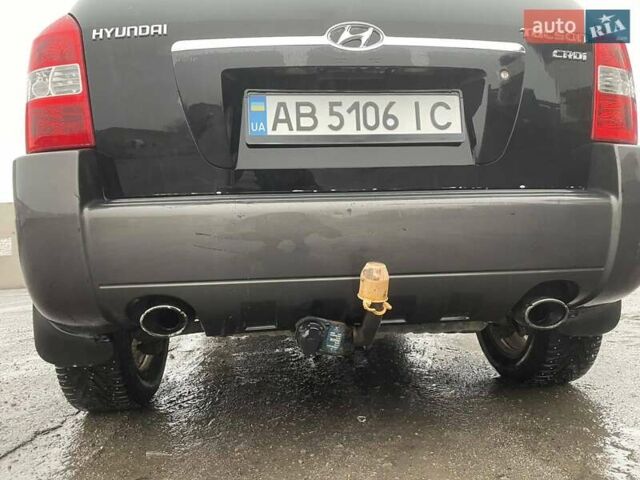 Черный Хендай Туксон, объемом двигателя 1.99 л и пробегом 204 тыс. км за 6100 $, фото 27 на Automoto.ua