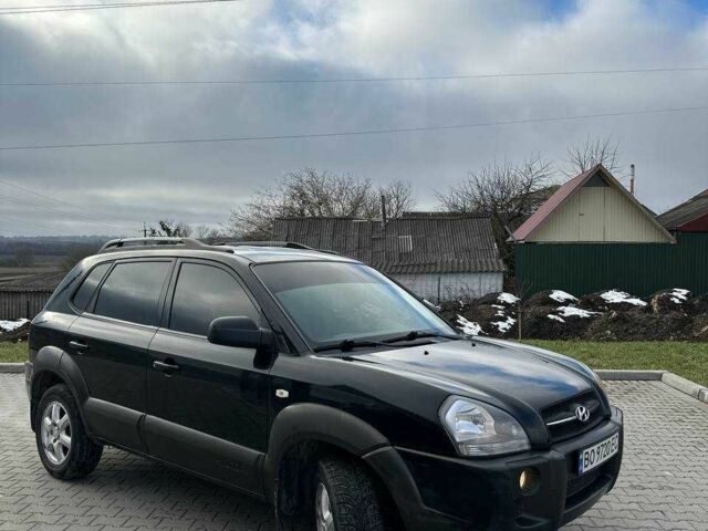 Черный Хендай Туксон, объемом двигателя 2 л и пробегом 180 тыс. км за 6450 $, фото 14 на Automoto.ua