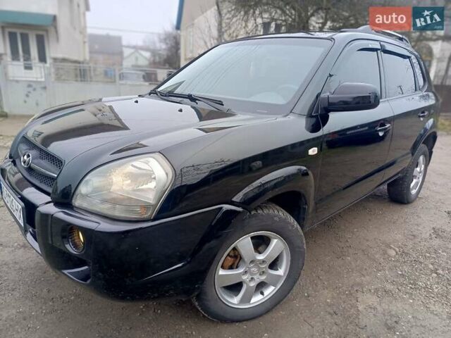 Черный Хендай Туксон, объемом двигателя 1.99 л и пробегом 302 тыс. км за 6300 $, фото 14 на Automoto.ua