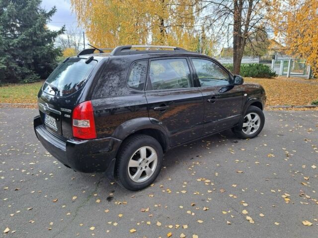 Черный Хендай Туксон, объемом двигателя 2 л и пробегом 280 тыс. км за 3250 $, фото 2 на Automoto.ua