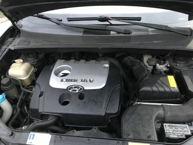 Чорний Хендай Туксон, об'ємом двигуна 2 л та пробігом 270 тис. км за 5850 $, фото 6 на Automoto.ua