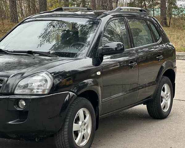 Черный Хендай Туксон, объемом двигателя 2 л и пробегом 280 тыс. км за 3250 $, фото 5 на Automoto.ua