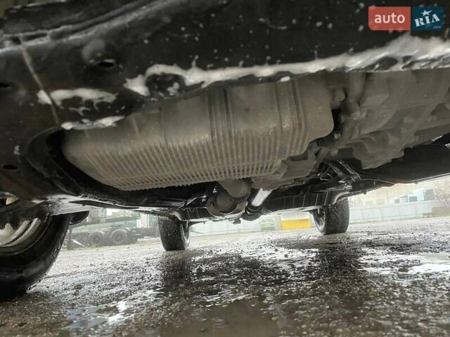 Черный Хендай Туксон, объемом двигателя 1.99 л и пробегом 204 тыс. км за 6100 $, фото 34 на Automoto.ua