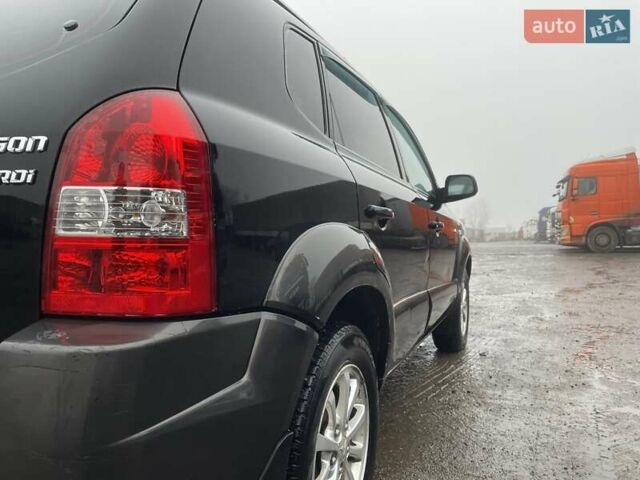 Черный Хендай Туксон, объемом двигателя 1.99 л и пробегом 204 тыс. км за 6100 $, фото 25 на Automoto.ua