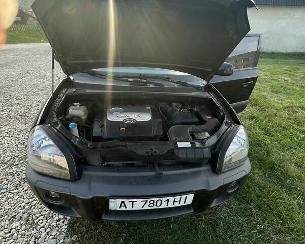 Чорний Хендай Туксон, об'ємом двигуна 1.99 л та пробігом 292 тис. км за 7500 $, фото 3 на Automoto.ua