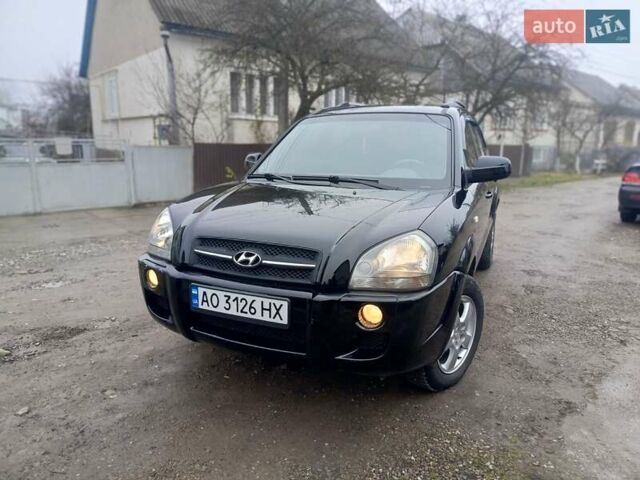 Черный Хендай Туксон, объемом двигателя 1.99 л и пробегом 302 тыс. км за 6300 $, фото 20 на Automoto.ua