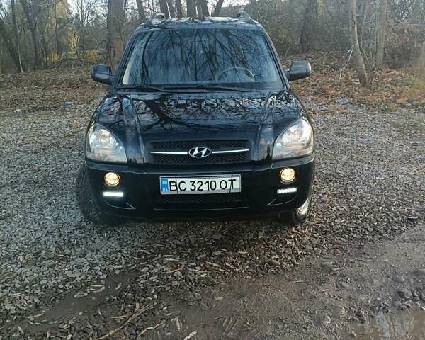 Черный Хендай Туксон, объемом двигателя 2 л и пробегом 236 тыс. км за 6000 $, фото 4 на Automoto.ua