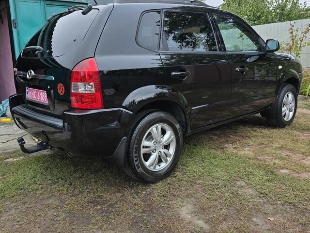 Черный Хендай Туксон, объемом двигателя 2 л и пробегом 137 тыс. км за 7499 $, фото 13 на Automoto.ua