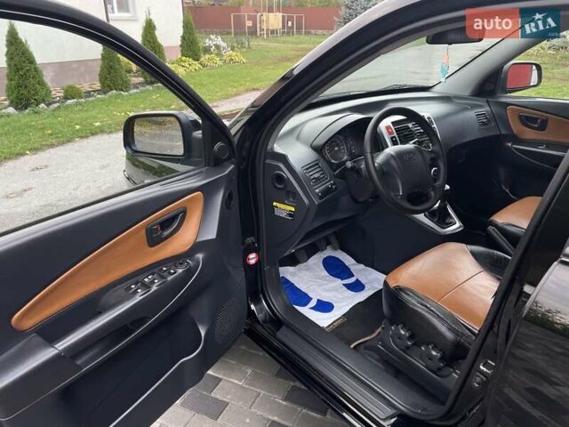 Хендай Туксон 2005 у Хороле на Automoto.ua Чорний Хендай Туксон, об'ємом двигуна 2 л та пробігом 163 тис. км за 7700 $, фото 9 на Automoto.ua