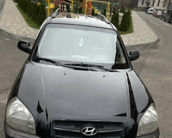 Чорний Хендай Туксон, об'ємом двигуна 1.98 л та пробігом 225 тис. км за 6600 $, фото 6 на Automoto.ua