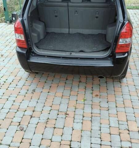 Чорний Хендай Туксон, об'ємом двигуна 1.98 л та пробігом 213 тис. км за 7500 $, фото 6 на Automoto.ua