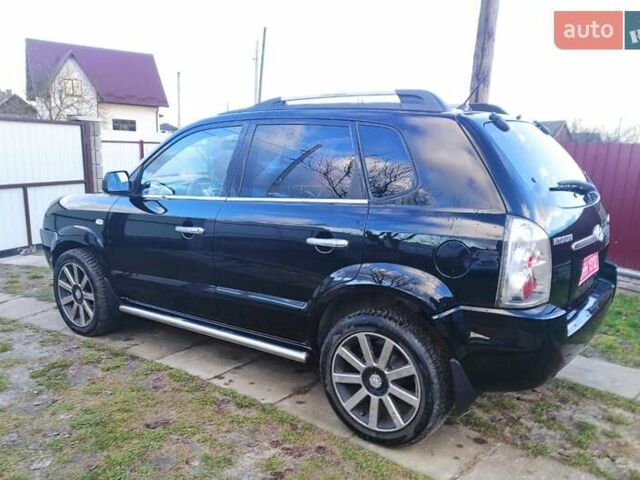 Черный Хендай Туксон, объемом двигателя 2 л и пробегом 208 тыс. км за 6950 $, фото 37 на Automoto.ua