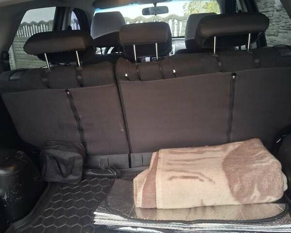 Черный Хендай Туксон, объемом двигателя 2 л и пробегом 224 тыс. км за 6800 $, фото 7 на Automoto.ua