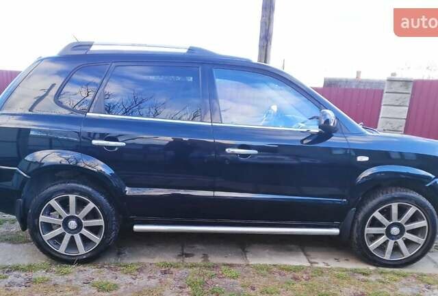 Черный Хендай Туксон, объемом двигателя 2 л и пробегом 208 тыс. км за 6950 $, фото 7 на Automoto.ua
