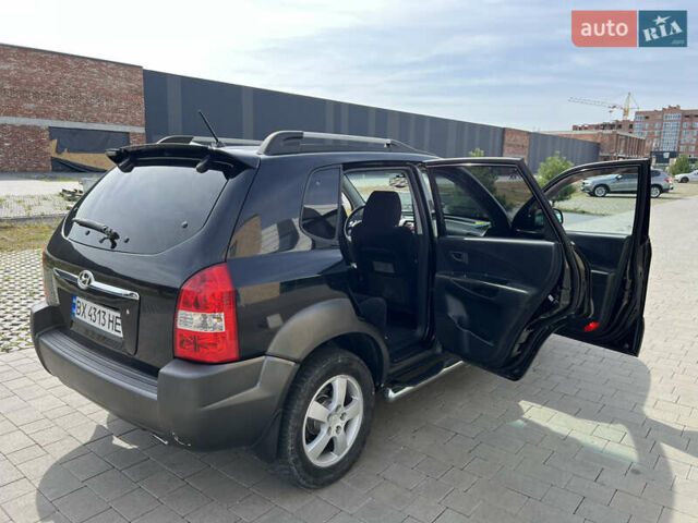 Чорний Хендай Туксон, об'ємом двигуна 2 л та пробігом 255 тис. км за 6900 $, фото 27 на Automoto.ua