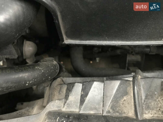 Черный Хендай Туксон, объемом двигателя 2 л и пробегом 261 тыс. км за 6500 $, фото 17 на Automoto.ua