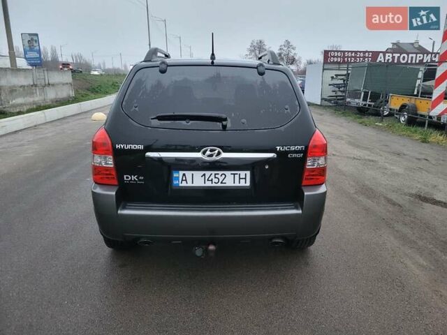 Чорний Хендай Туксон, об'ємом двигуна 2 л та пробігом 180 тис. км за 4500 $, фото 4 на Automoto.ua