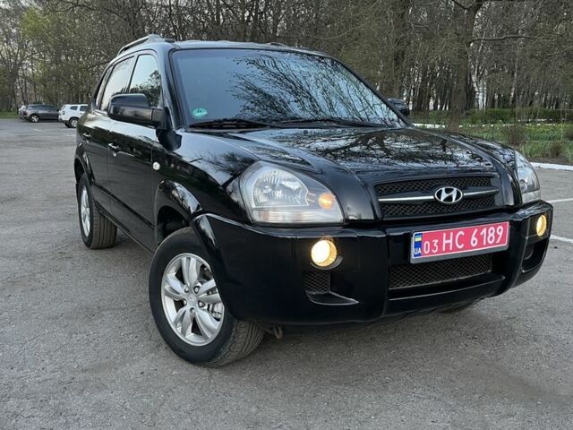 Черный Хендай Туксон, объемом двигателя 2 л и пробегом 137 тыс. км за 7499 $, фото 1 на Automoto.ua