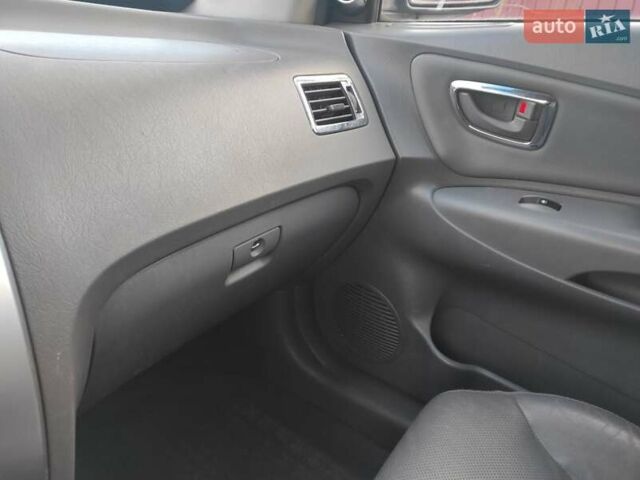 Черный Хендай Туксон, объемом двигателя 2 л и пробегом 208 тыс. км за 6950 $, фото 13 на Automoto.ua