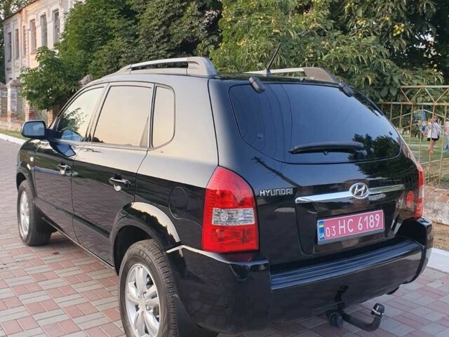 Черный Хендай Туксон, объемом двигателя 2 л и пробегом 137 тыс. км за 7499 $, фото 7 на Automoto.ua
