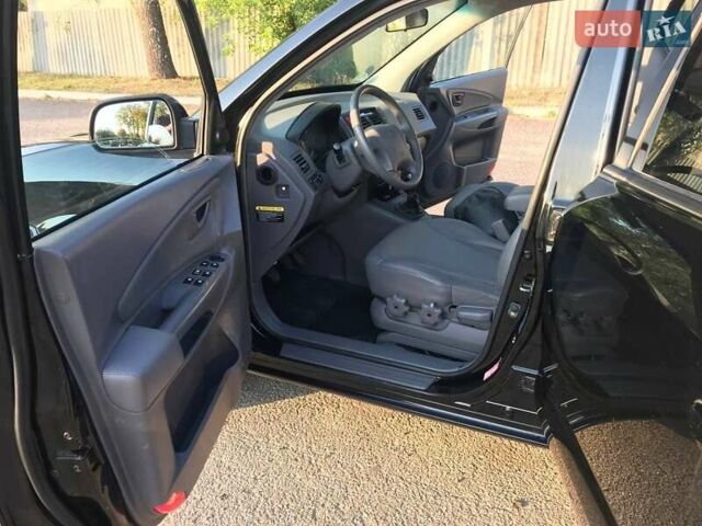 Черный Хендай Туксон, объемом двигателя 2 л и пробегом 253 тыс. км за 7500 $, фото 2 на Automoto.ua