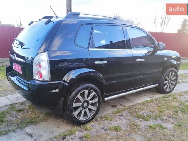 Черный Хендай Туксон, объемом двигателя 2 л и пробегом 208 тыс. км за 6950 $, фото 9 на Automoto.ua