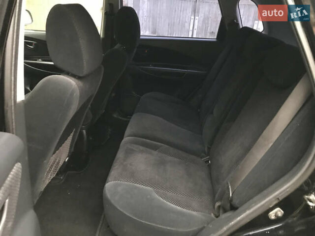 Черный Хендай Туксон, объемом двигателя 2 л и пробегом 261 тыс. км за 6500 $, фото 12 на Automoto.ua