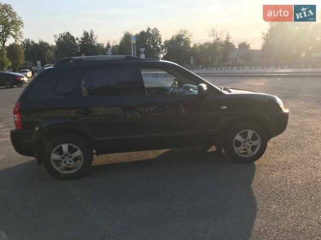 Черный Хендай Туксон, объемом двигателя 2 л и пробегом 253 тыс. км за 7500 $, фото 7 на Automoto.ua