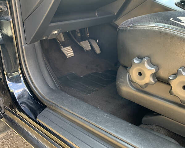 Черный Хендай Туксон, объемом двигателя 2 л и пробегом 219 тыс. км за 8400 $, фото 18 на Automoto.ua