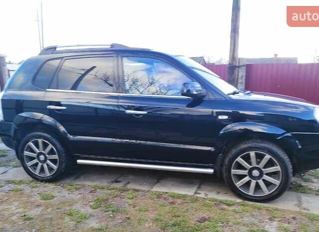 Черный Хендай Туксон, объемом двигателя 2 л и пробегом 208 тыс. км за 6950 $, фото 52 на Automoto.ua