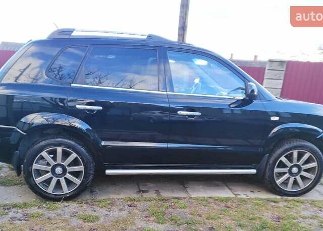 Черный Хендай Туксон, объемом двигателя 2 л и пробегом 208 тыс. км за 6950 $, фото 53 на Automoto.ua
